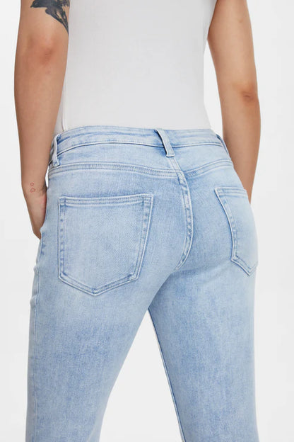 HIGH RISE SLIM JEANS WITH RAW HEM