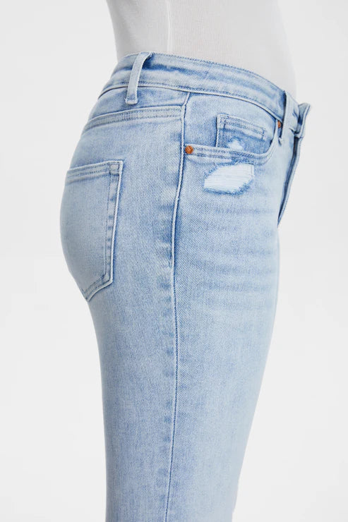 HIGH RISE SLIM JEANS WITH RAW HEM